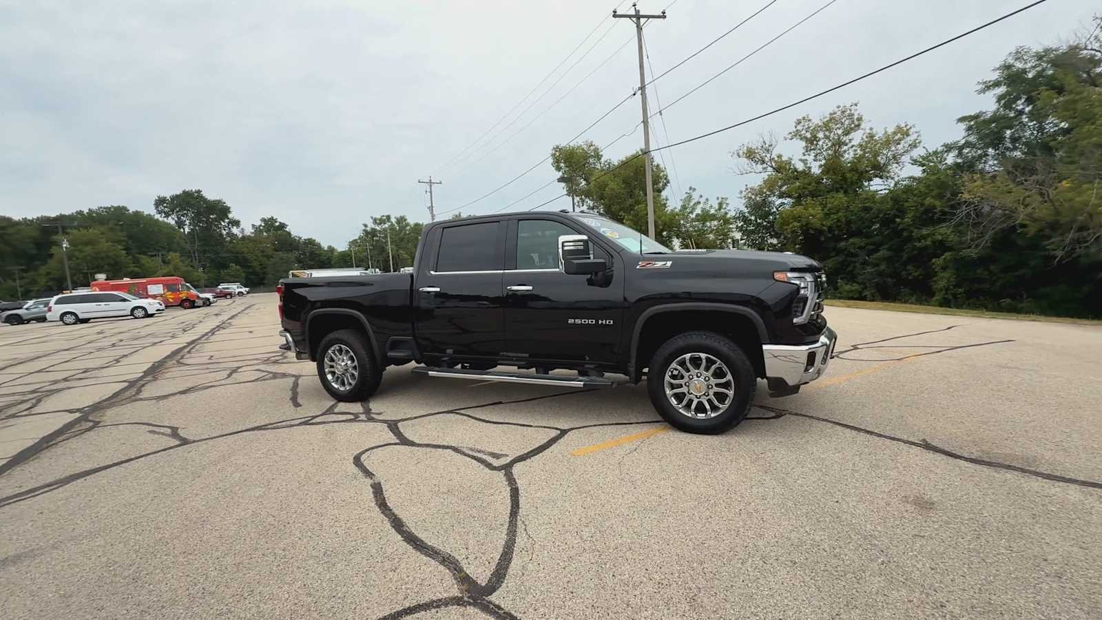 Certified Used 2024 Black Chevrolet LTZ image 2