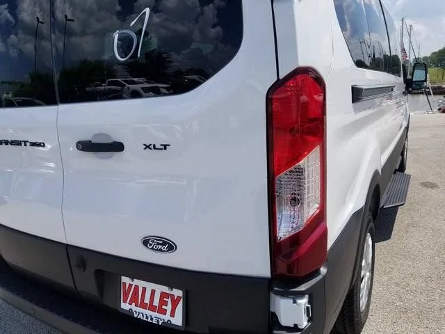 New 2026 Oxford White Ford Passenger Van XLT image 10