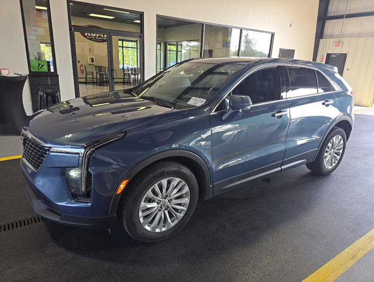 Used 2024 Blue Cadillac Luxury image 1
