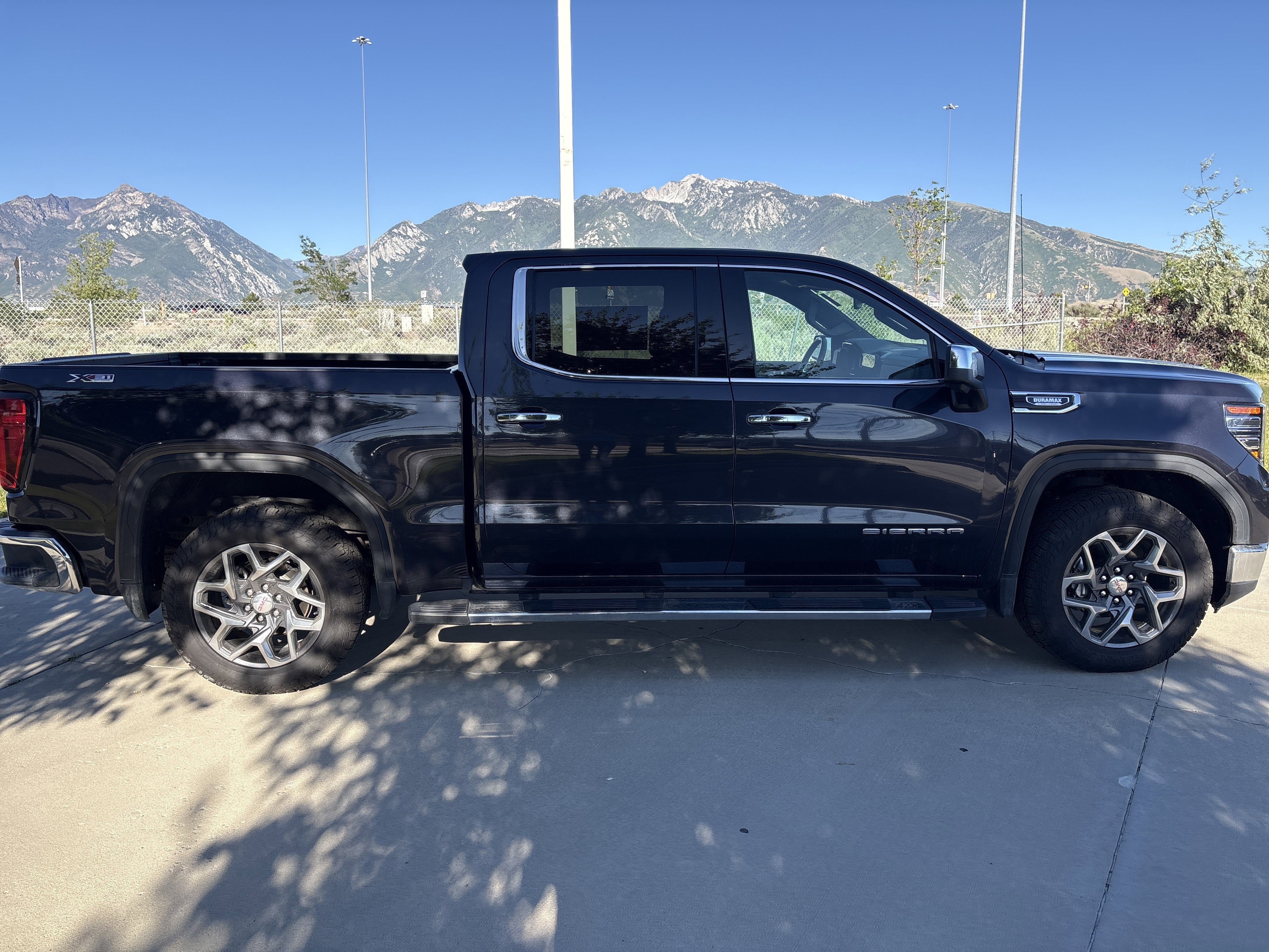 Used 2022 Titanium Rush Metallic GMC SLT image 6