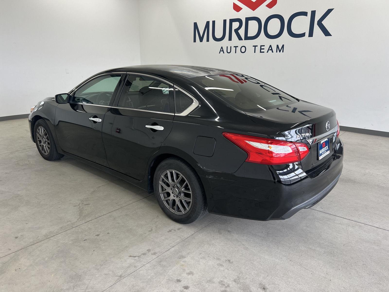 Used 2016 Super Black Nissan 2.5 S image 2