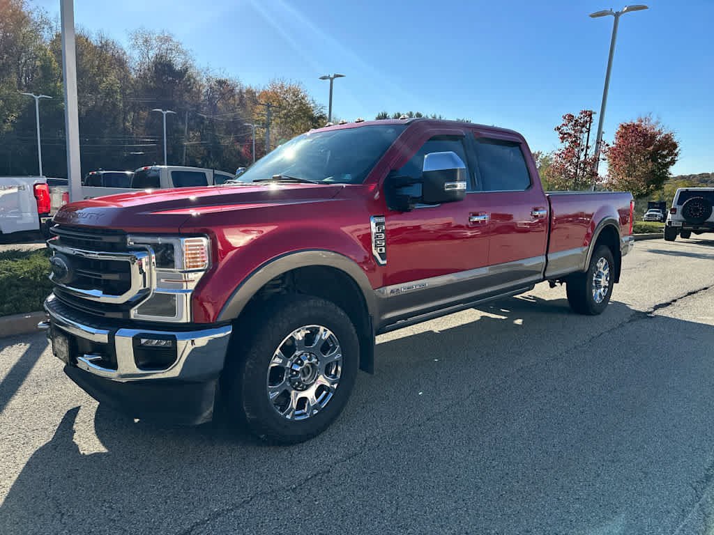 Used 2022 Rapid Red Metallic Tinted Clearcoat/Stone Gray Ford King Ranch 4WD Crew Cab 8 Box image 1
