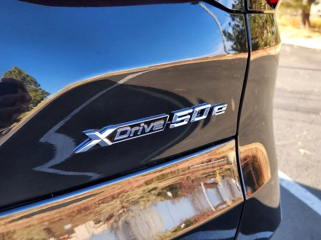 Used 2026 Black Sapphire Metallic BMW xDrive50e image 21