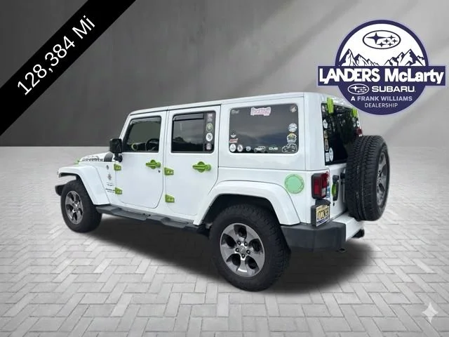 Used 2016 White Jeep Unlimited Sahara image 4