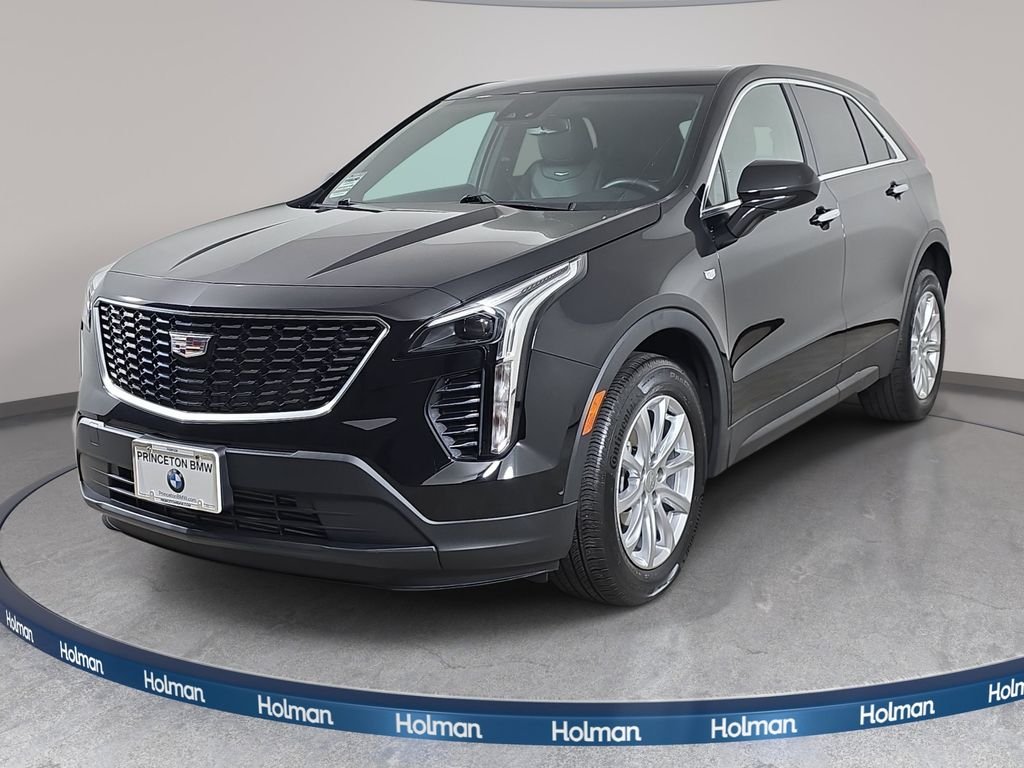 Used 2022 Stellar Black Metallic Cadillac Luxury image 1