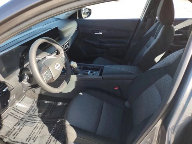 Used 2027 Gun Metallic Nissan SV image 12