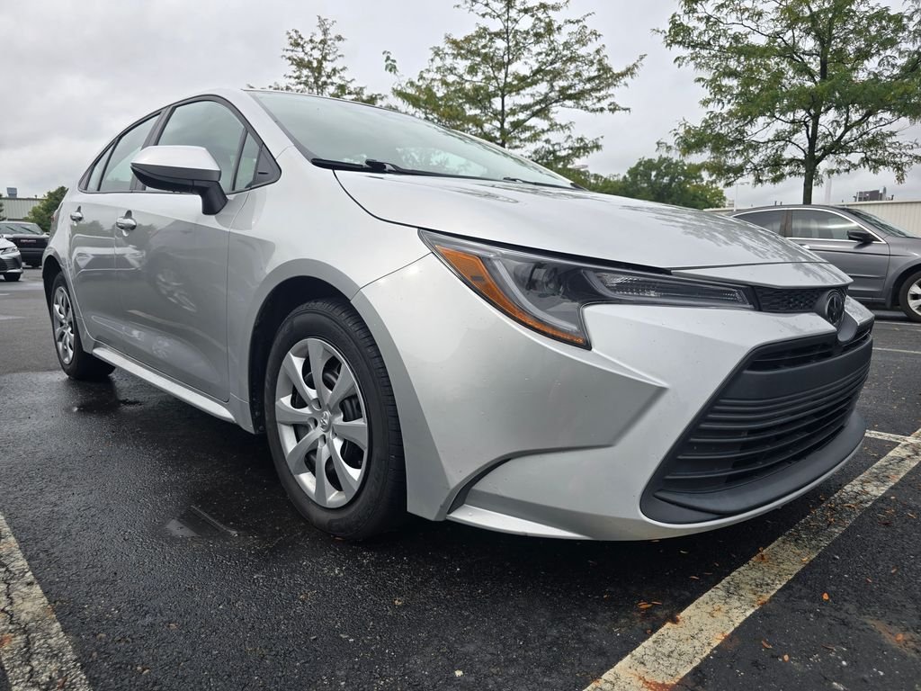 Used 2024 Silver Toyota LE image 1