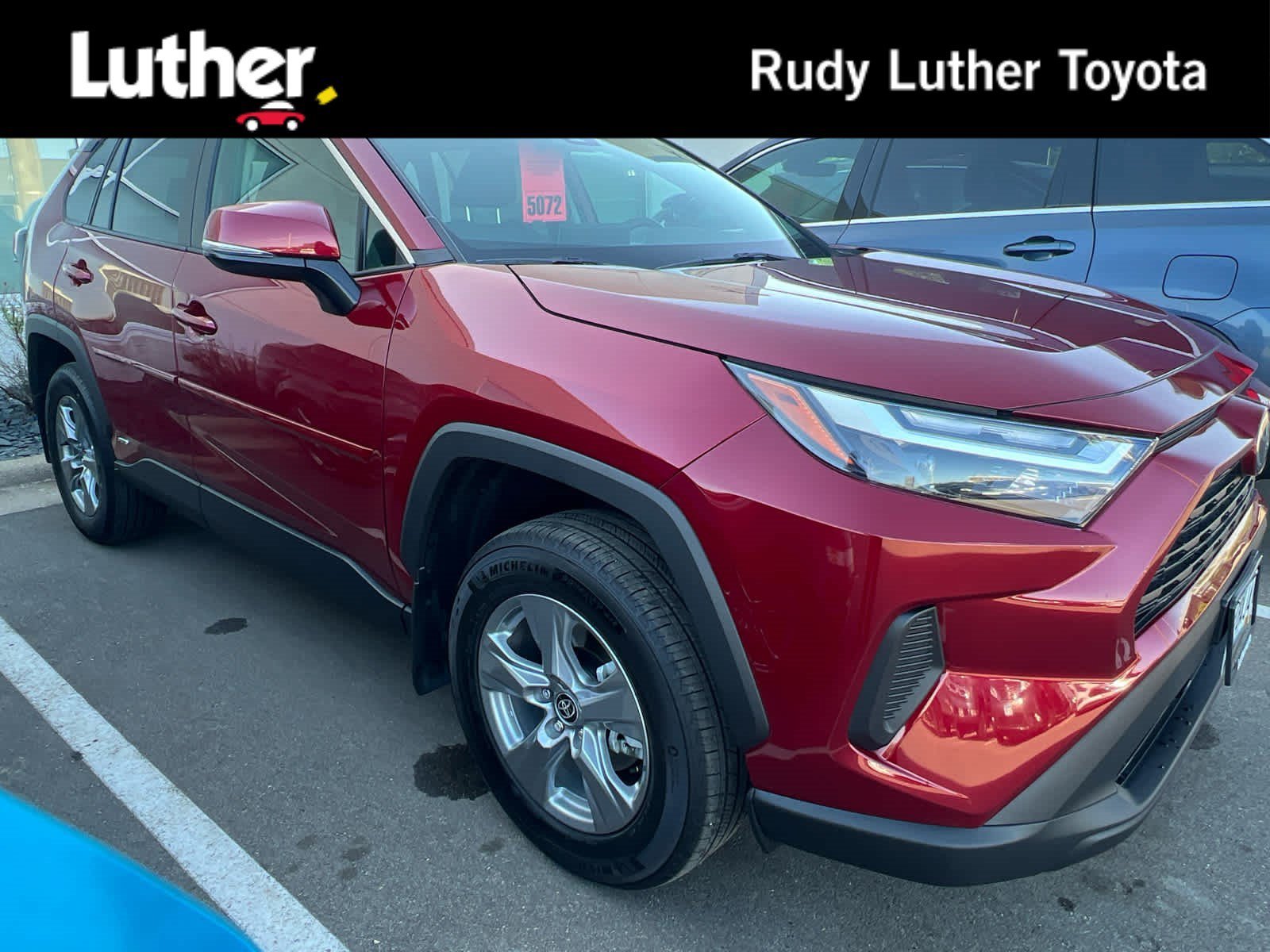 Used 2025 Ruby Flare Pearl Toyota Hybrid XLE image 1