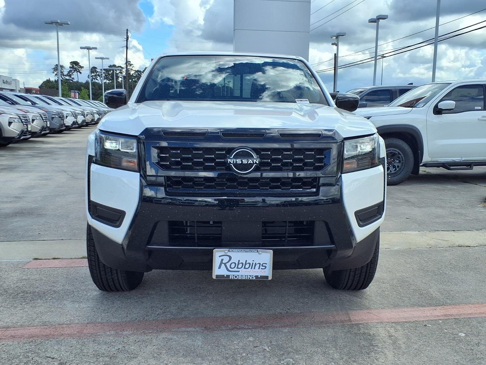 2026 Nissan Frontier Crew Cab SV White at Robbins Nissan