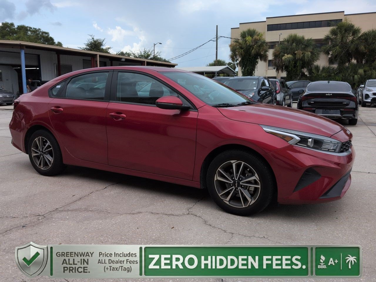 Certified Used 2023 Currant Red Kia LXS image 1