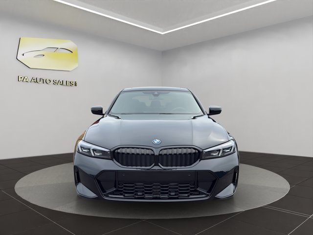 Used 2023 Black Sapphire Metallic BMW 330e xDrive image 2