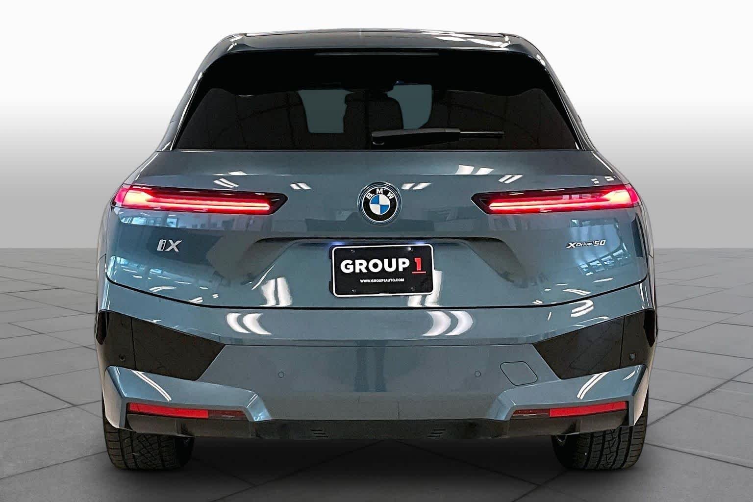 Used 2024 Blue Ridge Mountain Metallic BMW xDrive50 image 4