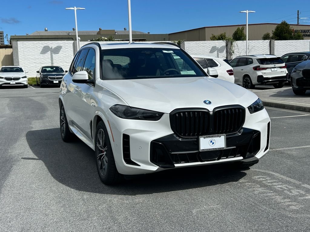 New 2026 Mineral White Metallic BMW xDrive50e image 7