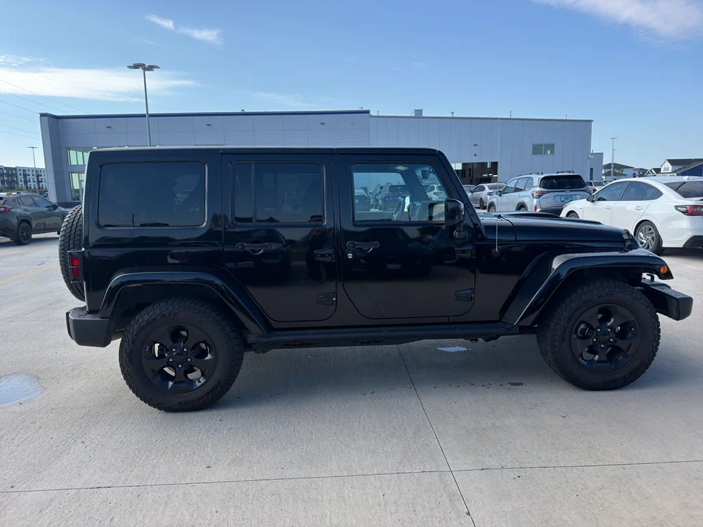 Used 2015 Black Clearcoat Jeep Altitude image 4