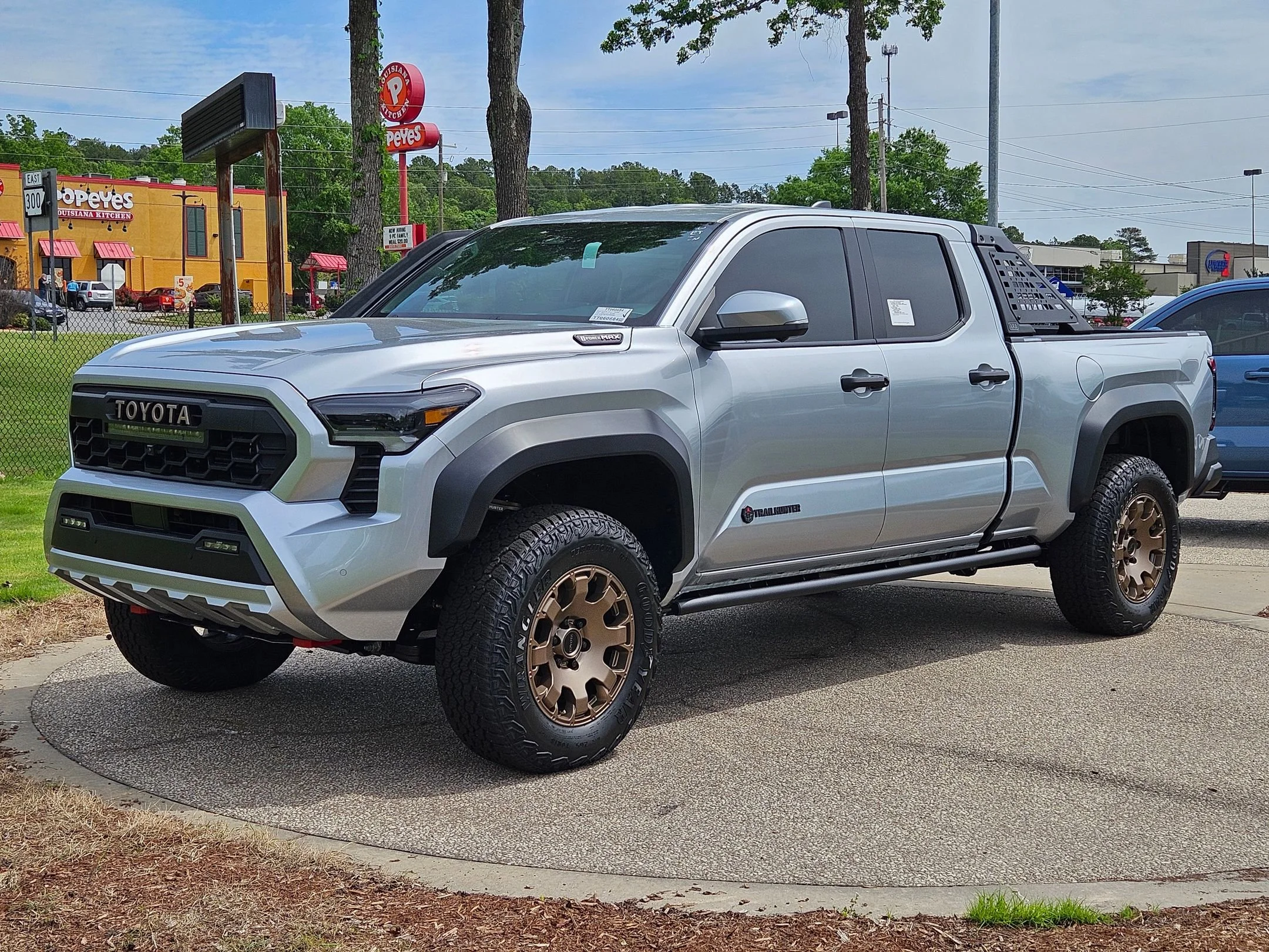 New 2026 Celestial Silver Metallic Toyota Trailhunter Hybrid image 3
