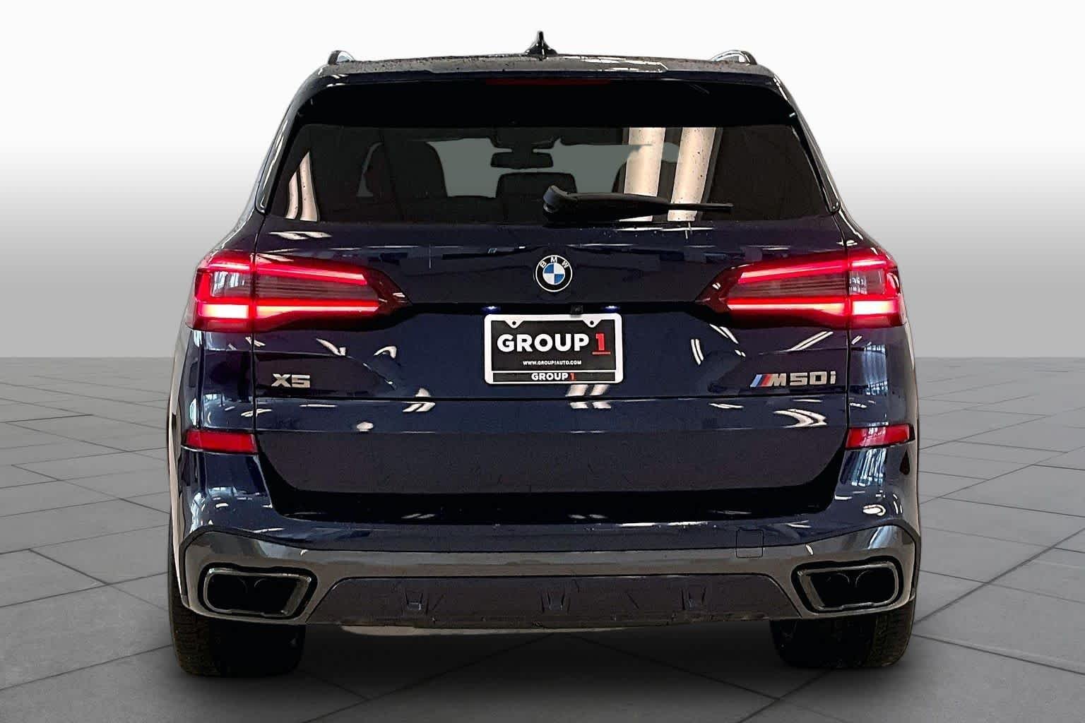 Certified Used 2021 Tanzanite Blue II Metallic BMW M50i image 4