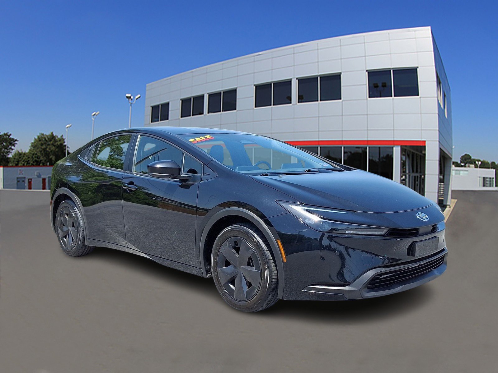 Used 2025 Midnight Black Metallic Toyota LE image 1