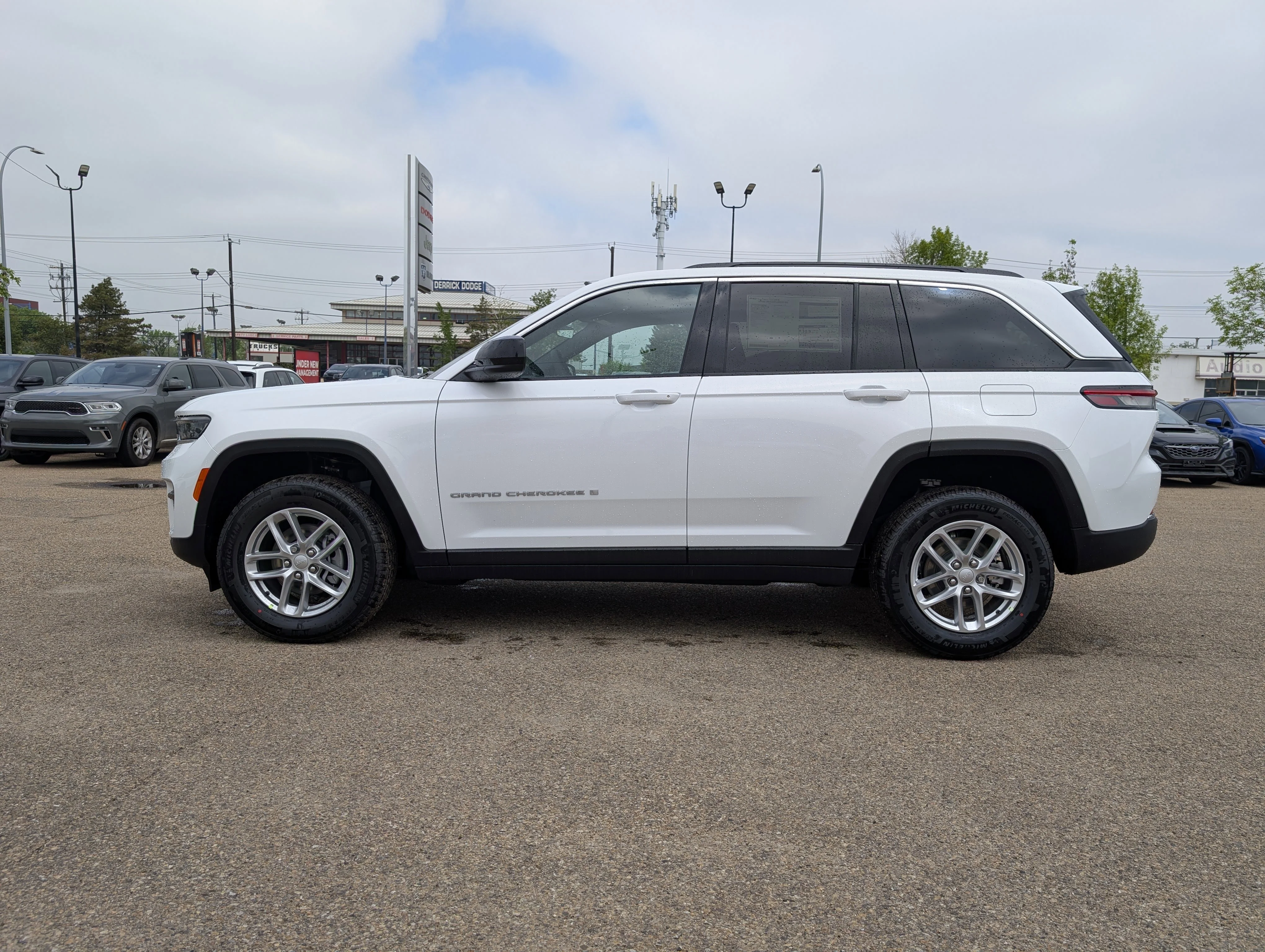 New 2026 Bright White Jeep Laredo image 3