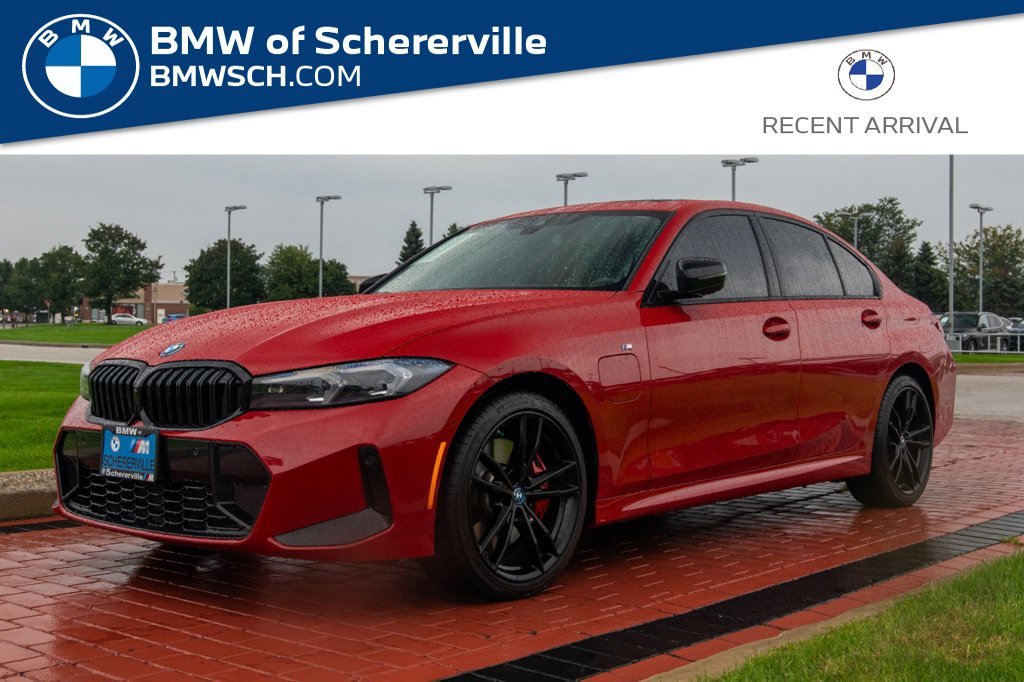 Used 2024 Melbourne Red Metallic BMW 330e xDrive image 1