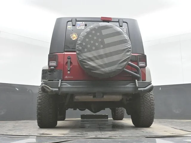 Used 2012 Red Jeep Unlimited Sport image 30