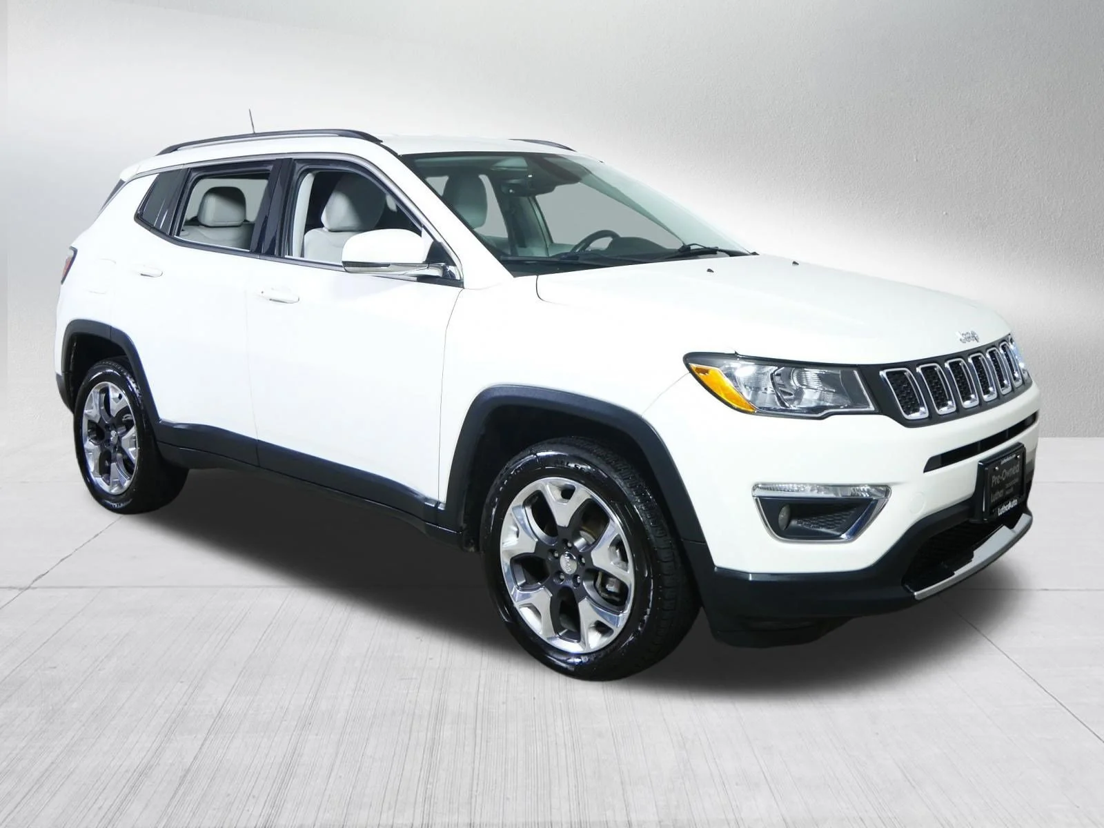 Used 2017 White Clearcoat Jeep Limited image 1