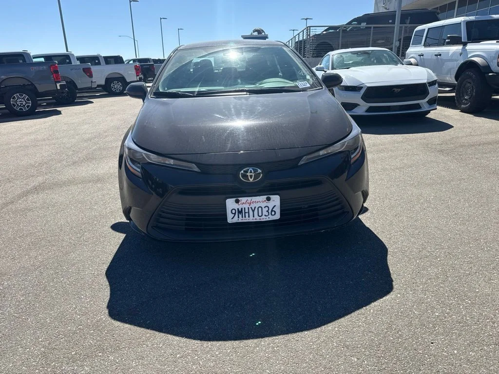 Used 2024 Midnight Black Metallic Toyota LE image 2