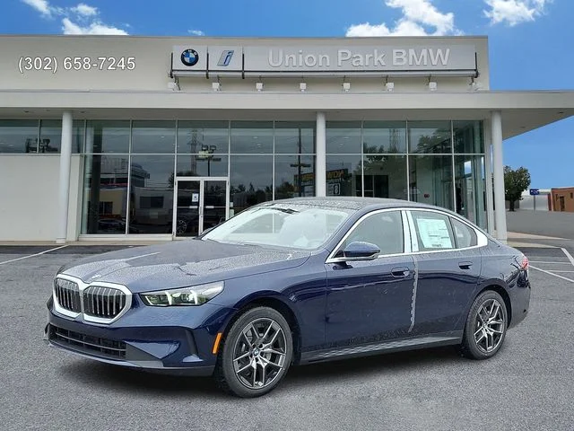 Used 2026 Tanzanite Blue II Metallic BMW 530i xDrive image 1