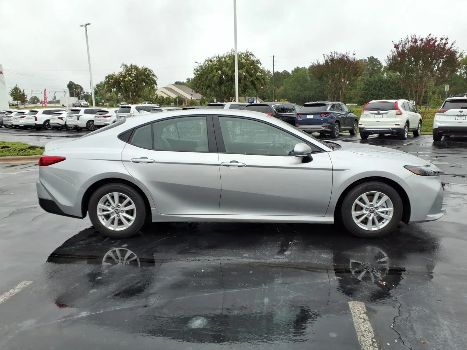 Used 2025 Celestial Silver Metallic Toyota LE image 10