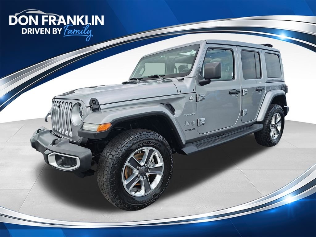 Used 2021 Silver Jeep Unlimited Sahara image 1