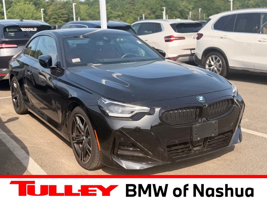 Used 2024 Black BMW 230i xDrive image 1