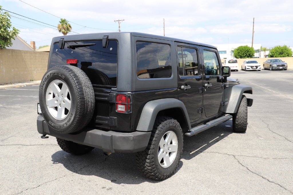 Used 2016 Jeep Wrangler Unlimited Sport S with VIN 1C4HJWDG4GL319257 for sale in Downey, CA