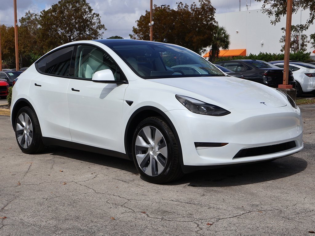 Used 2024 Tesla Model Y Long Range with VIN 7SAYGDEEXRA238091 for sale in Miami, FL