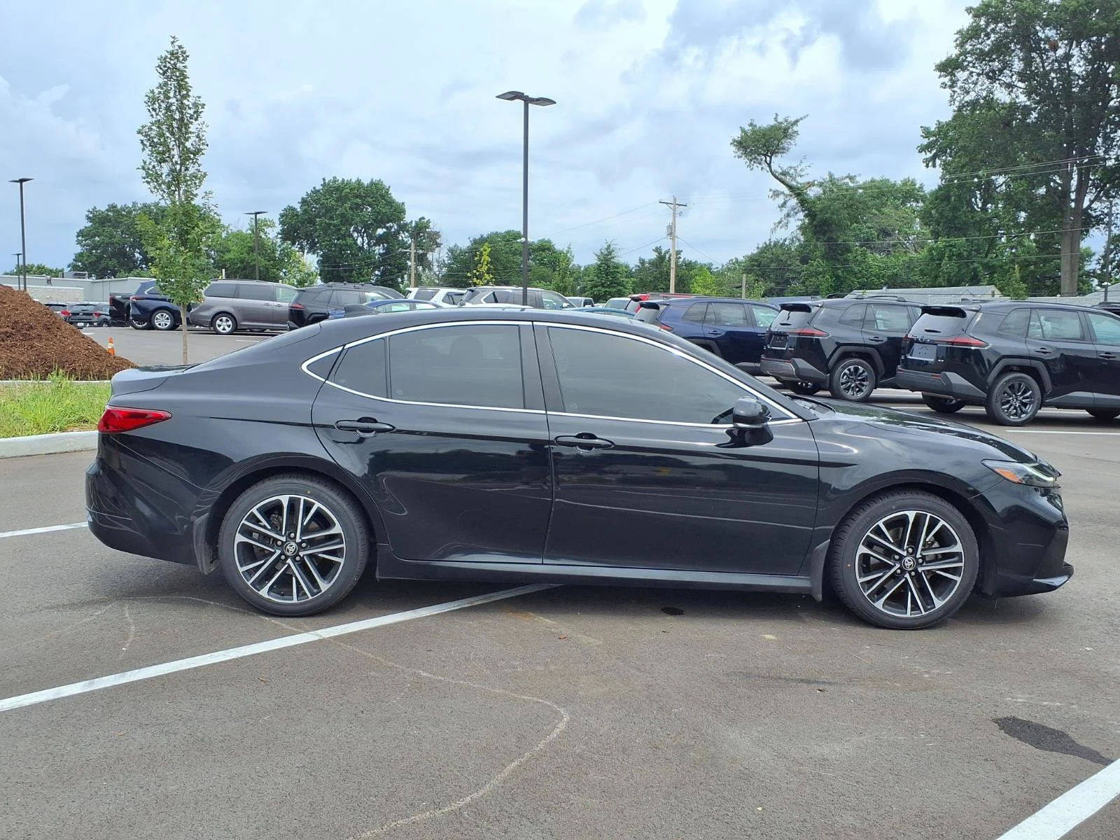 Certified Used 2025 Midnight Black Metallic Toyota XLE image 2