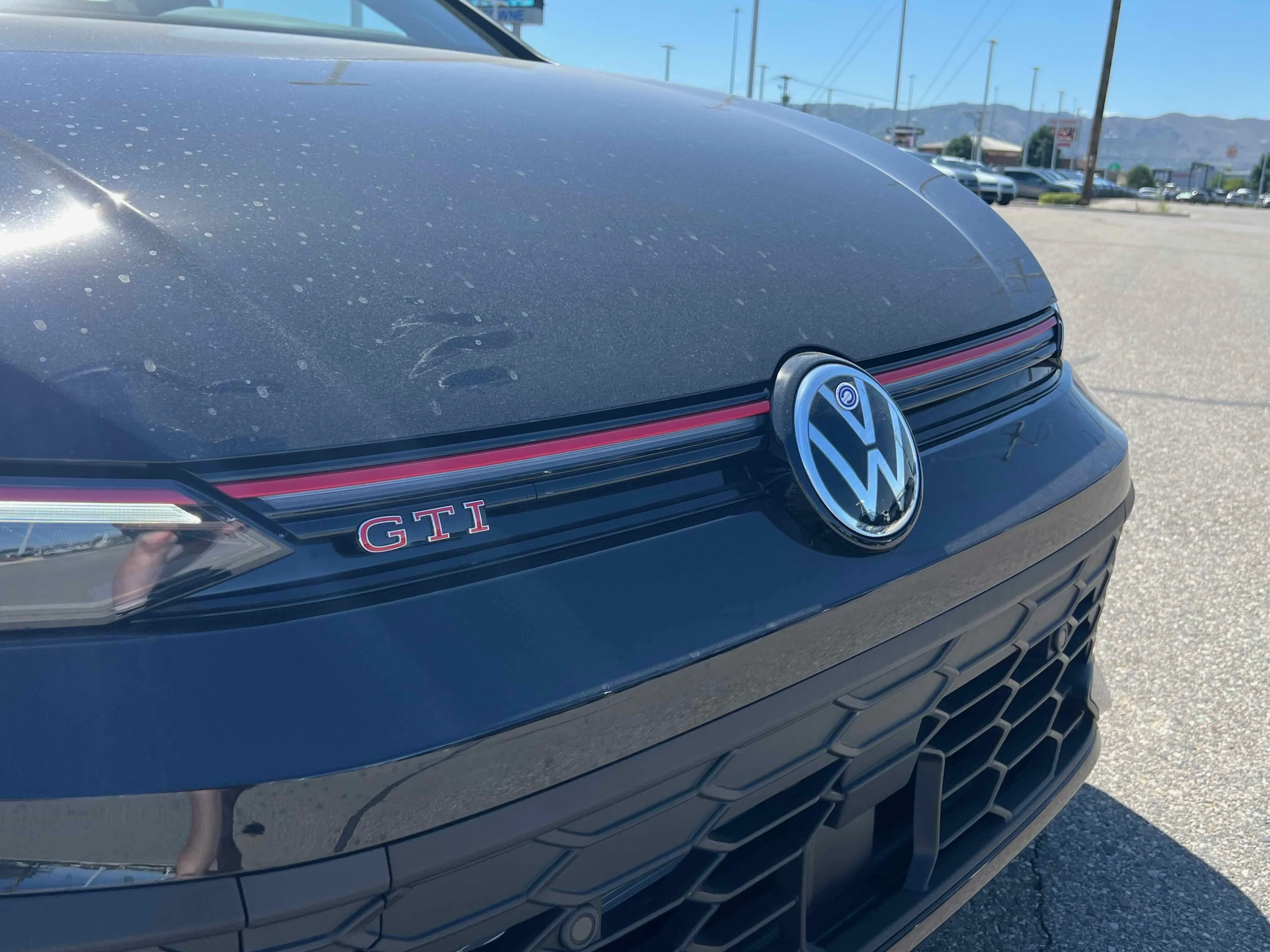 New 2025 Black Volkswagen SE image 7