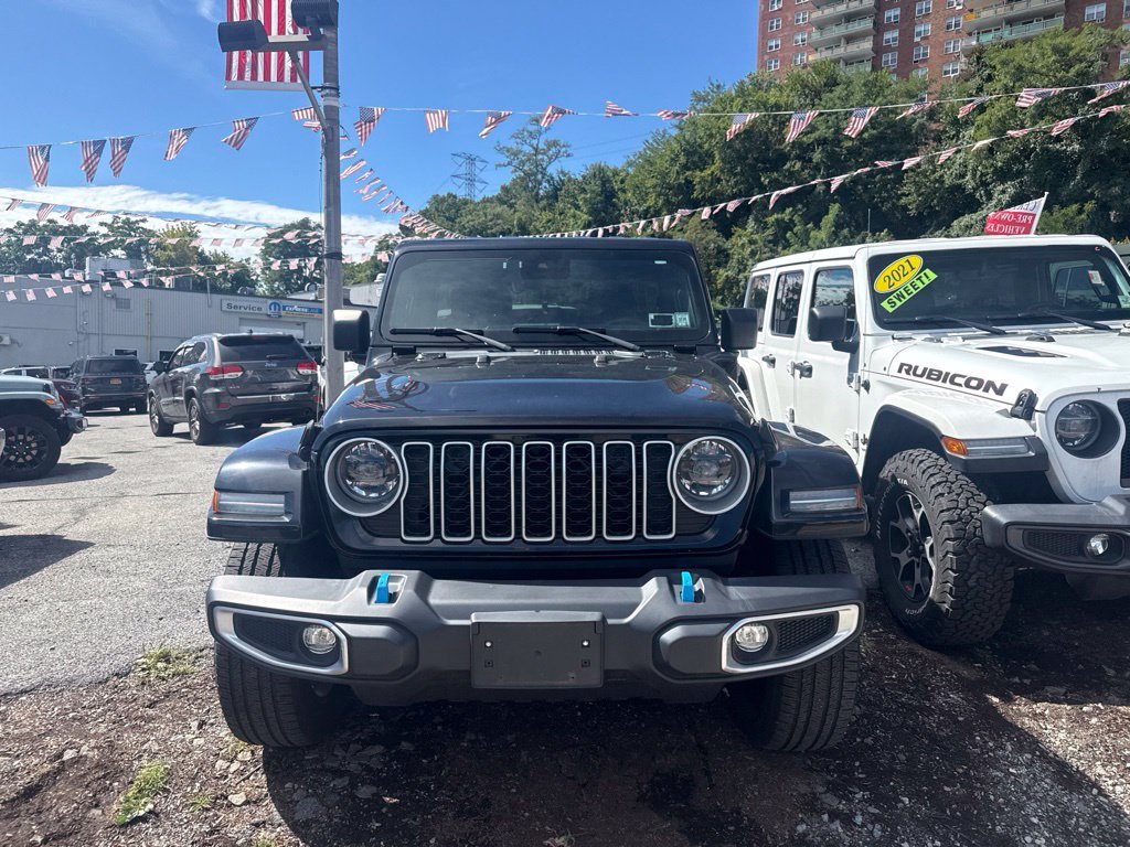 Used 2024 Black Jeep Sahara 4xe image 2
