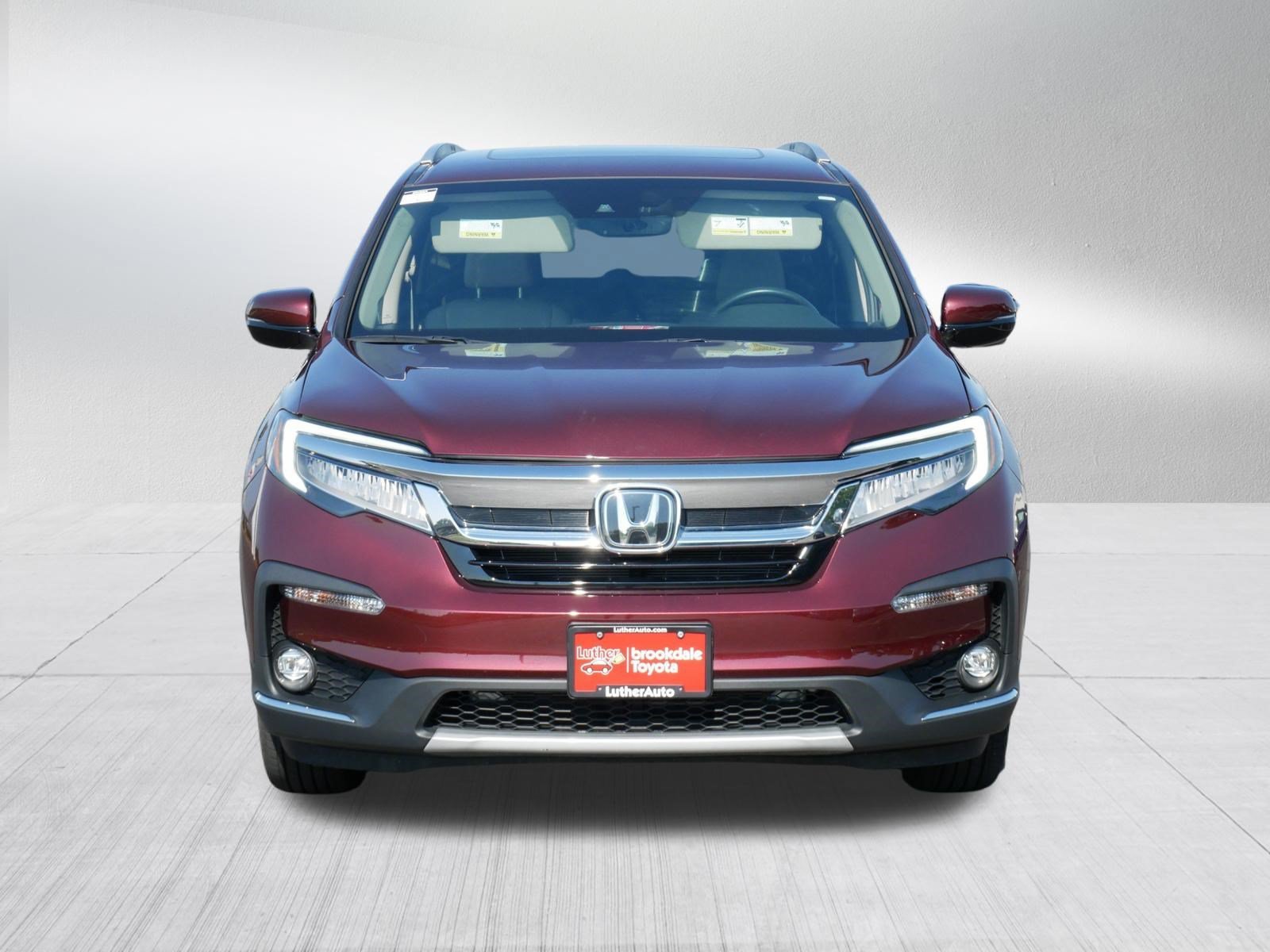 Used 2021 Honda Pilot Touring with VIN 5FNYF6H68MB048902 for sale in Brooklyn Center, Minnesota