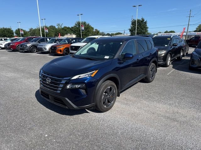 Used 2024 Blue Nissan SV image 1