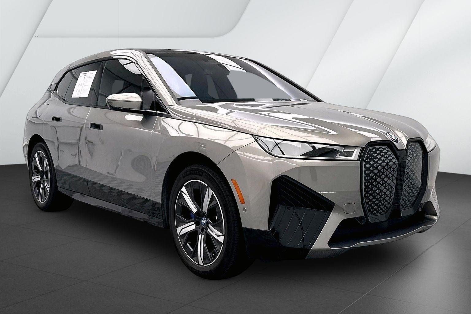 Used 2023 Oxide Grey Metallic BMW xDrive50 image 1