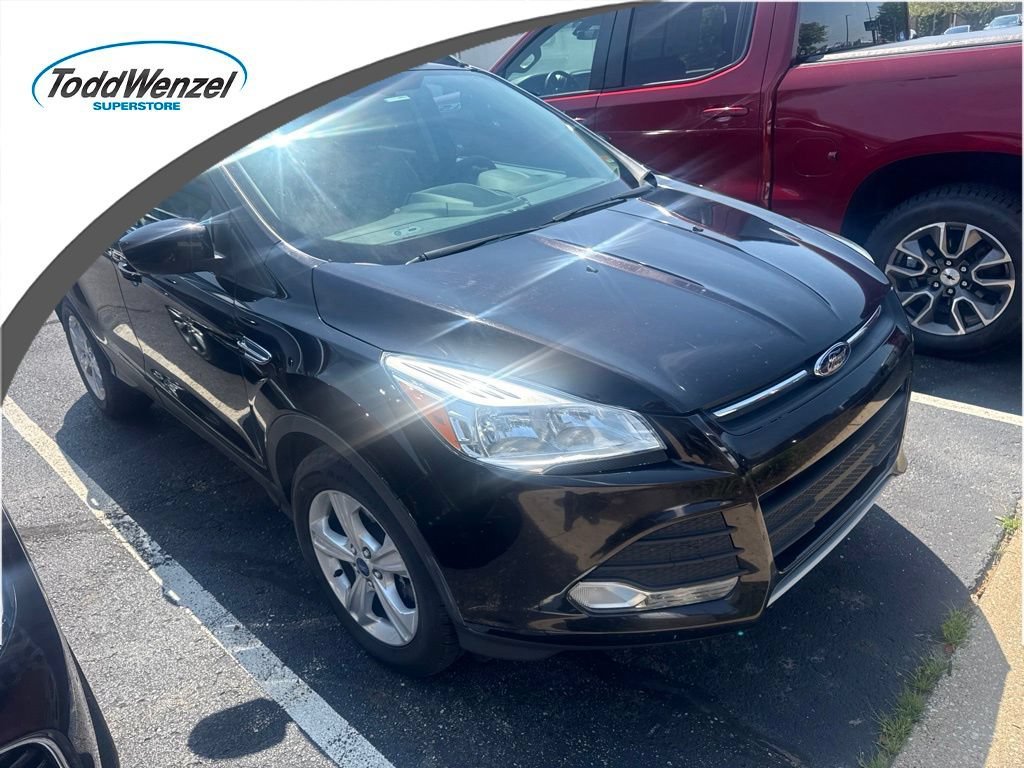 Used 2013 Brown Ford SE image 1