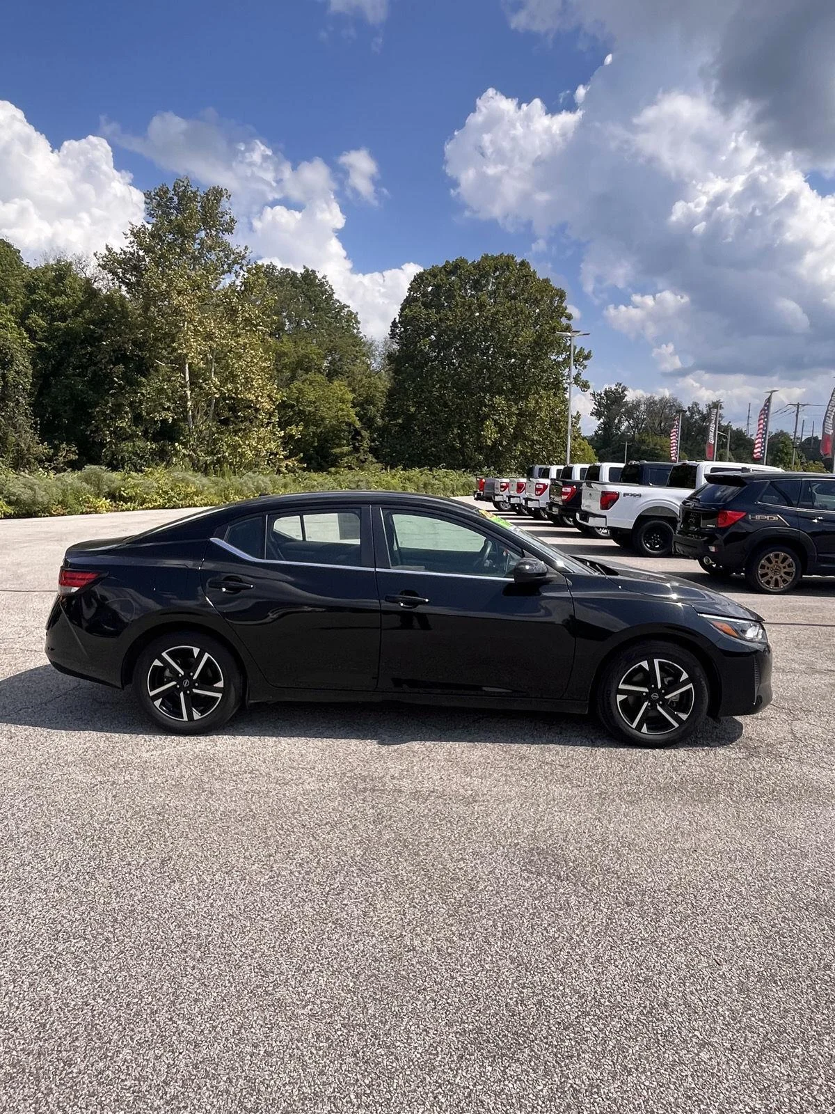 Used 2024 Super Black Nissan SV image 11