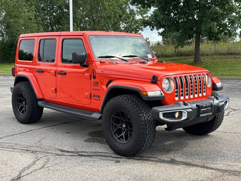 Used 2019 Orange Jeep Unlimited Sahara image 9