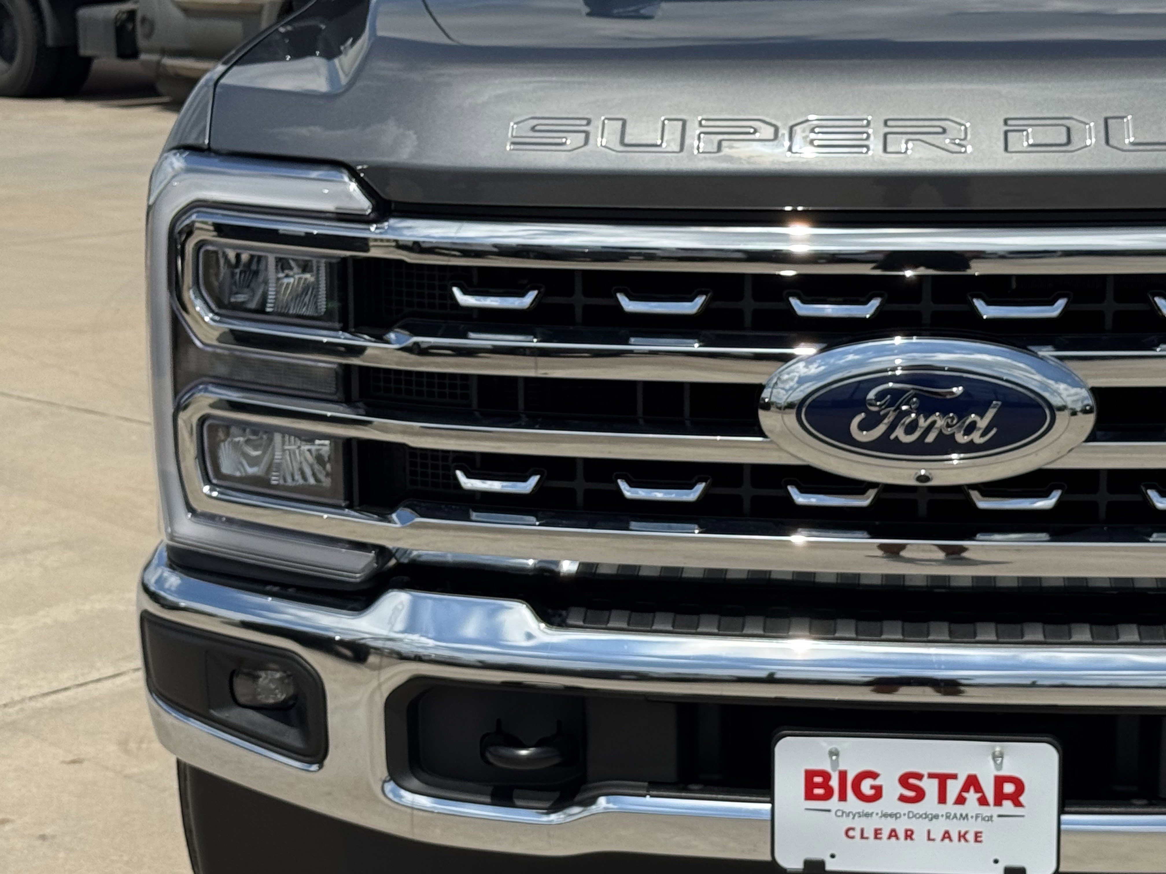 Used 2025 Gray Metallic Ford LARIAT 4WD Crew Cab 6.75
