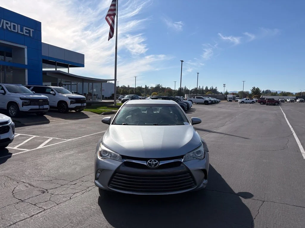 Used 2015 Celestial Silver Metallic Toyota LE image 2