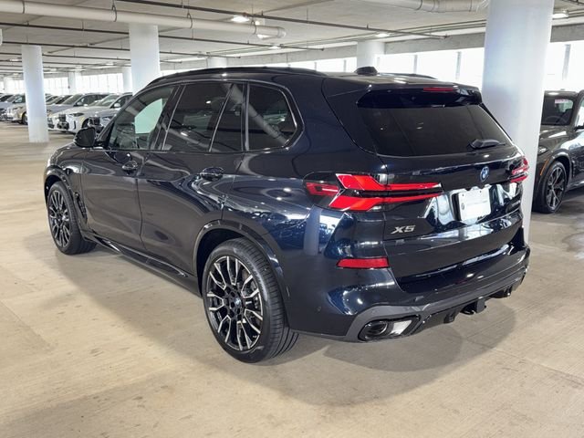 New 2026 Carbon Black Metallic BMW xDrive50e image 5