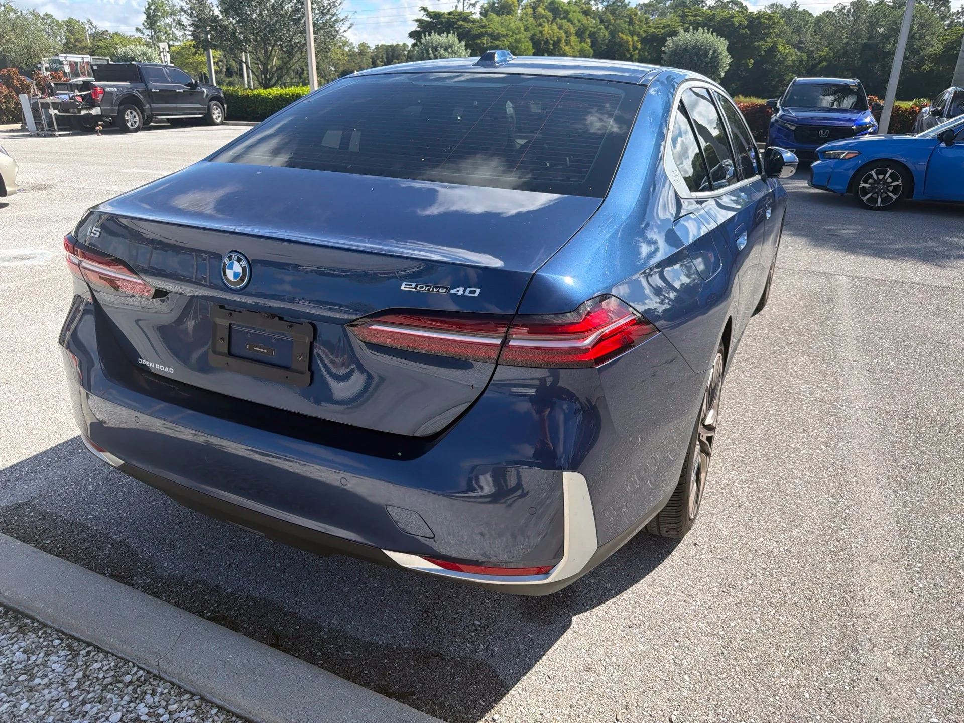 Used 2024 Blue Metallic BMW eDrive40 image 9