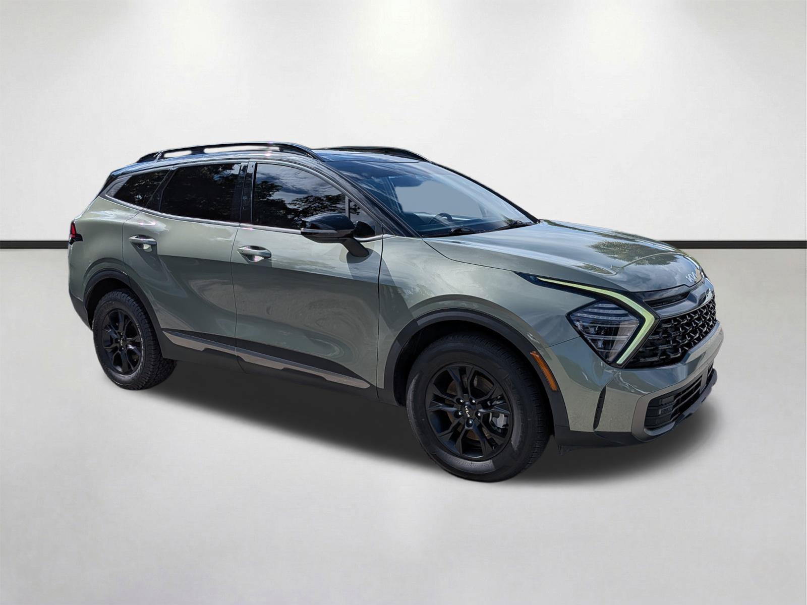 Used 2024 Jungle Green/Ebony Black Roof Kia X-Pro image 1