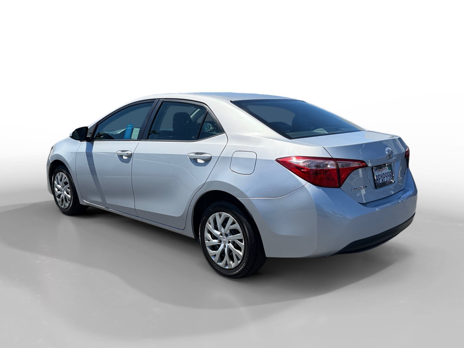 Used 2018 Classic Silver Metallic Toyota LE image 3