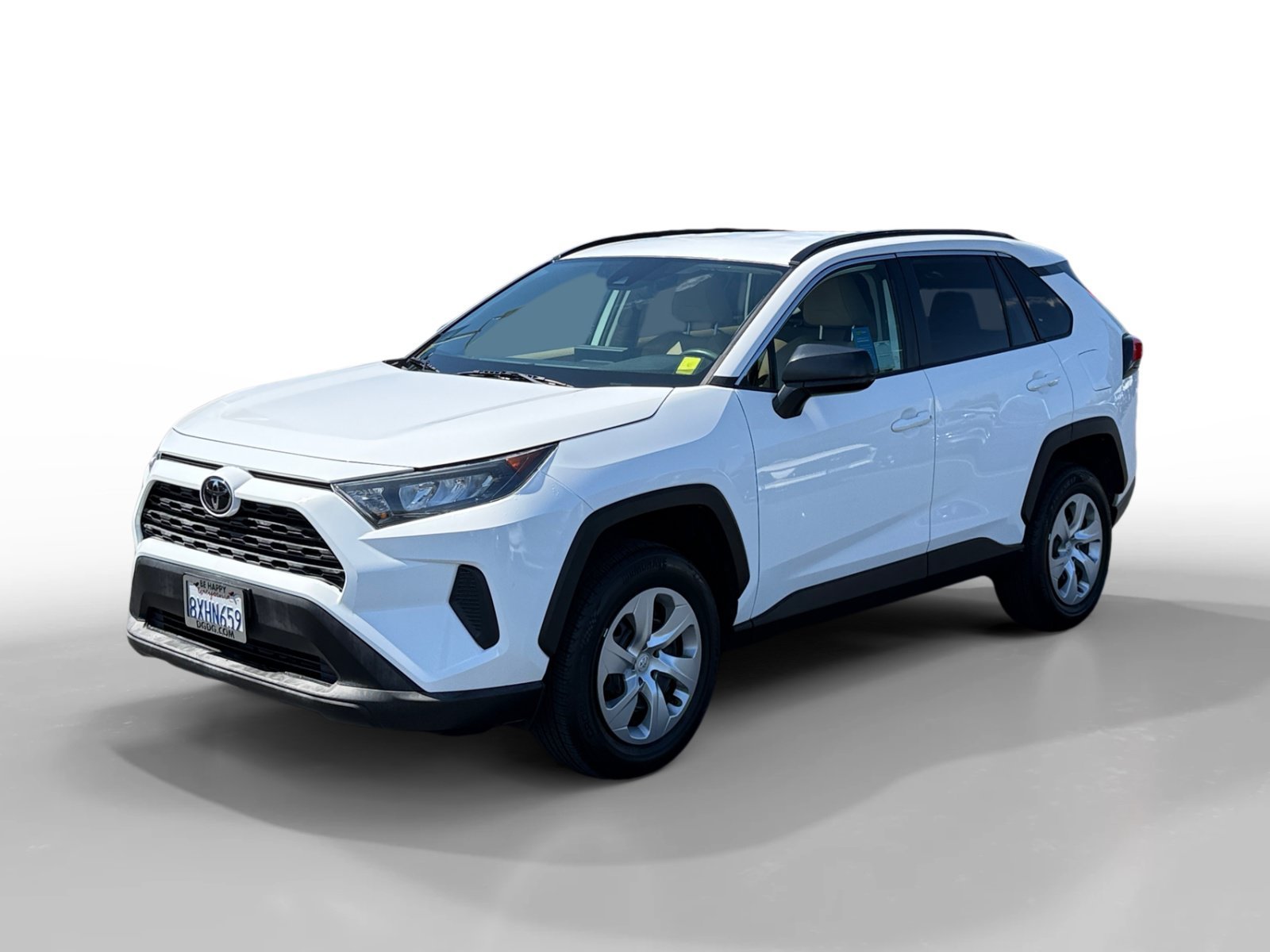 Used 2021 Super White Toyota LE image 1