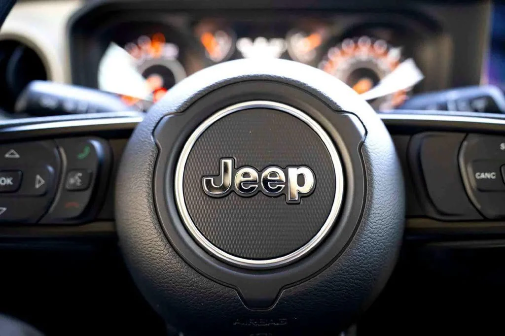 New 2026 Gray Jeep Sport image 12