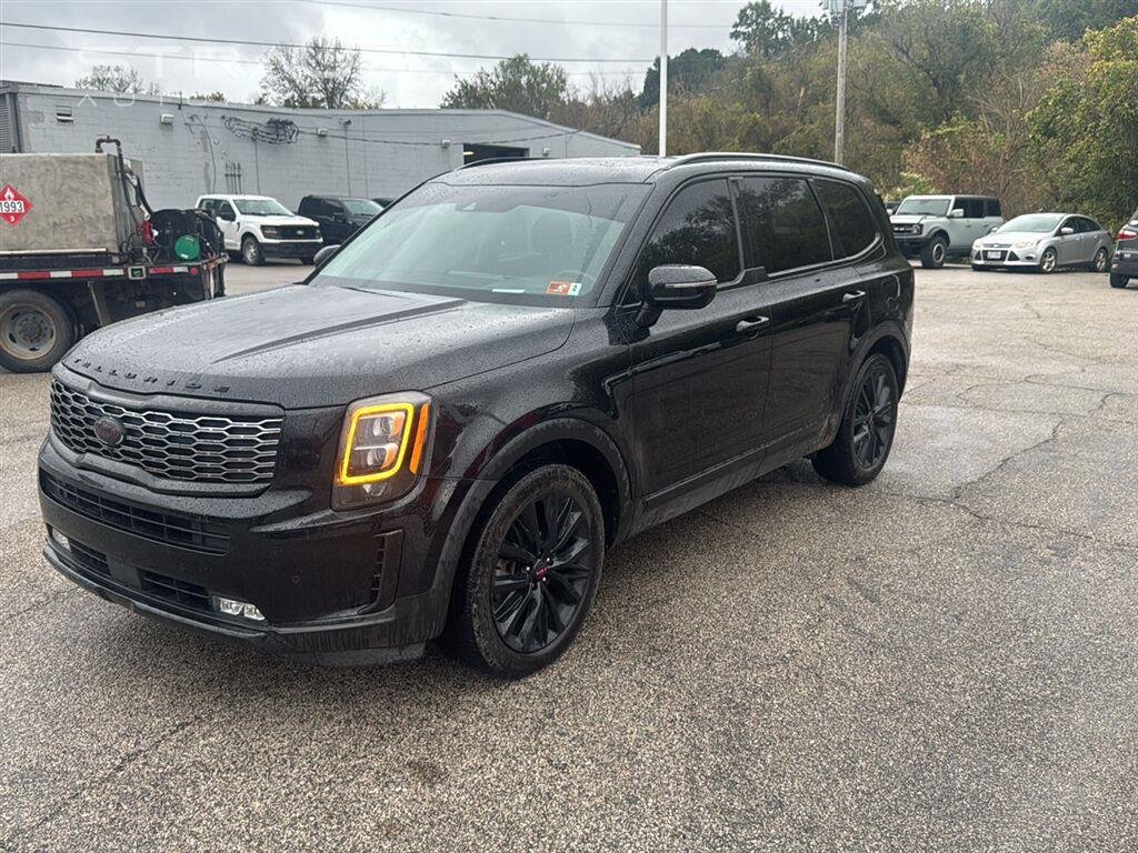 Used 2021 Ebony Black Kia SX image 1